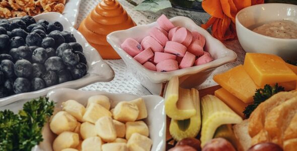 sliced fruits on white ceramic bowls